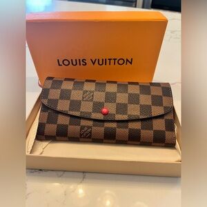 Brand New in box women’s large envelope wallet.